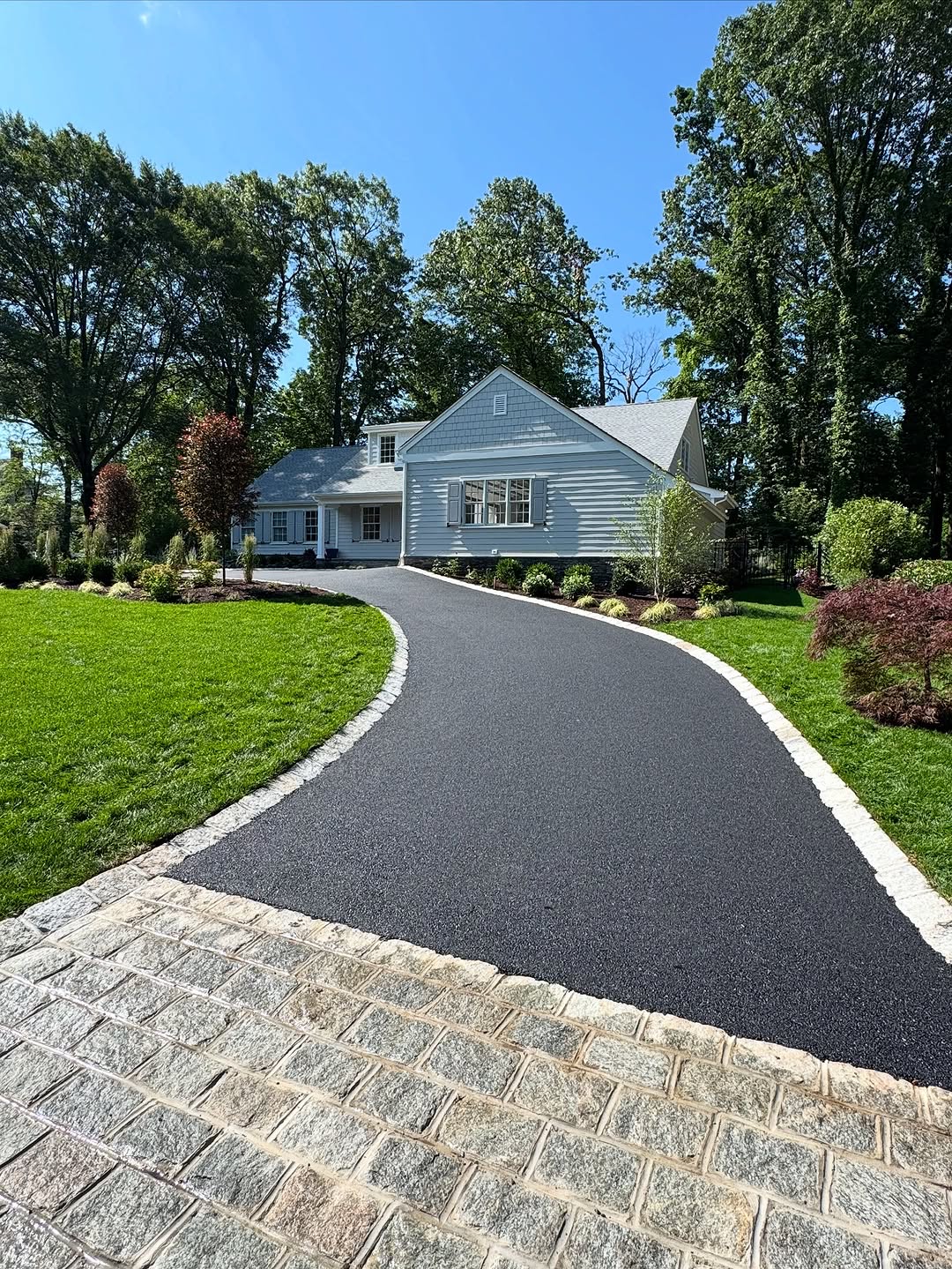 Asphalt Driveways Installed with Strong Base Preparation and Smooth, Even Finishing