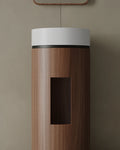 Solid-surface I-Stone sink with walnut base freestanding pedestal for Milton minimalist bathroom