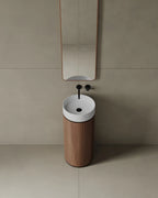 Compact 15-inch pedestal basin in GTA guest bath