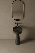 Sculptural 16-inch pedestal basin in GTA luxury ensuite