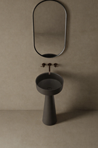 Sculptural 16-inch pedestal basin in GTA luxury ensuite