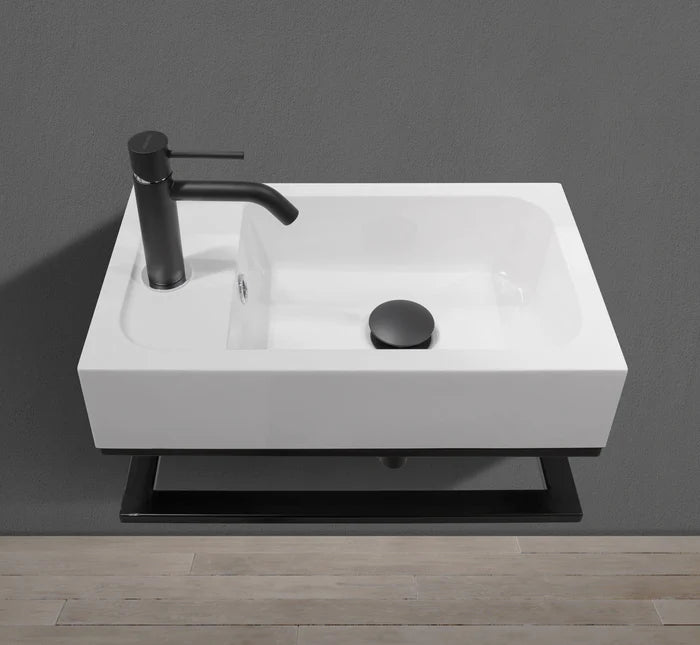 Space-saving 18-inch wall-mounted sink in GTA guest washroom