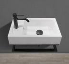 Space-saving 18-inch wall-mounted sink in GTA guest washroom