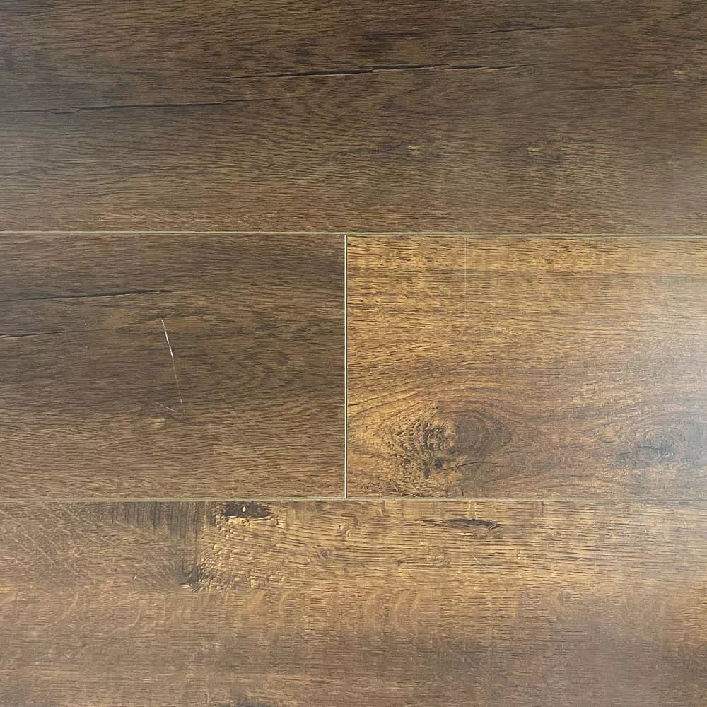 Realistic embossed natural oak grain detail on Darwin Oak click-lock laminate plank for Guelph hallways