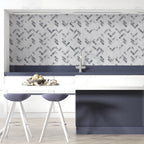 Arctic Mist herringbone marble mosaic as elegant kitchen backsplash in Milton GTA renovation