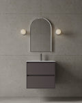 Space-saving 24-inch wall-mounted vanity with I-Stone top in GTA guest washroom