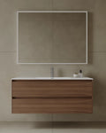 47-Inch wall-mounted vanity with seamless countertop and drawers in larger Mississauga primary bathroom renovation